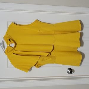yellow blouse with flutter neck